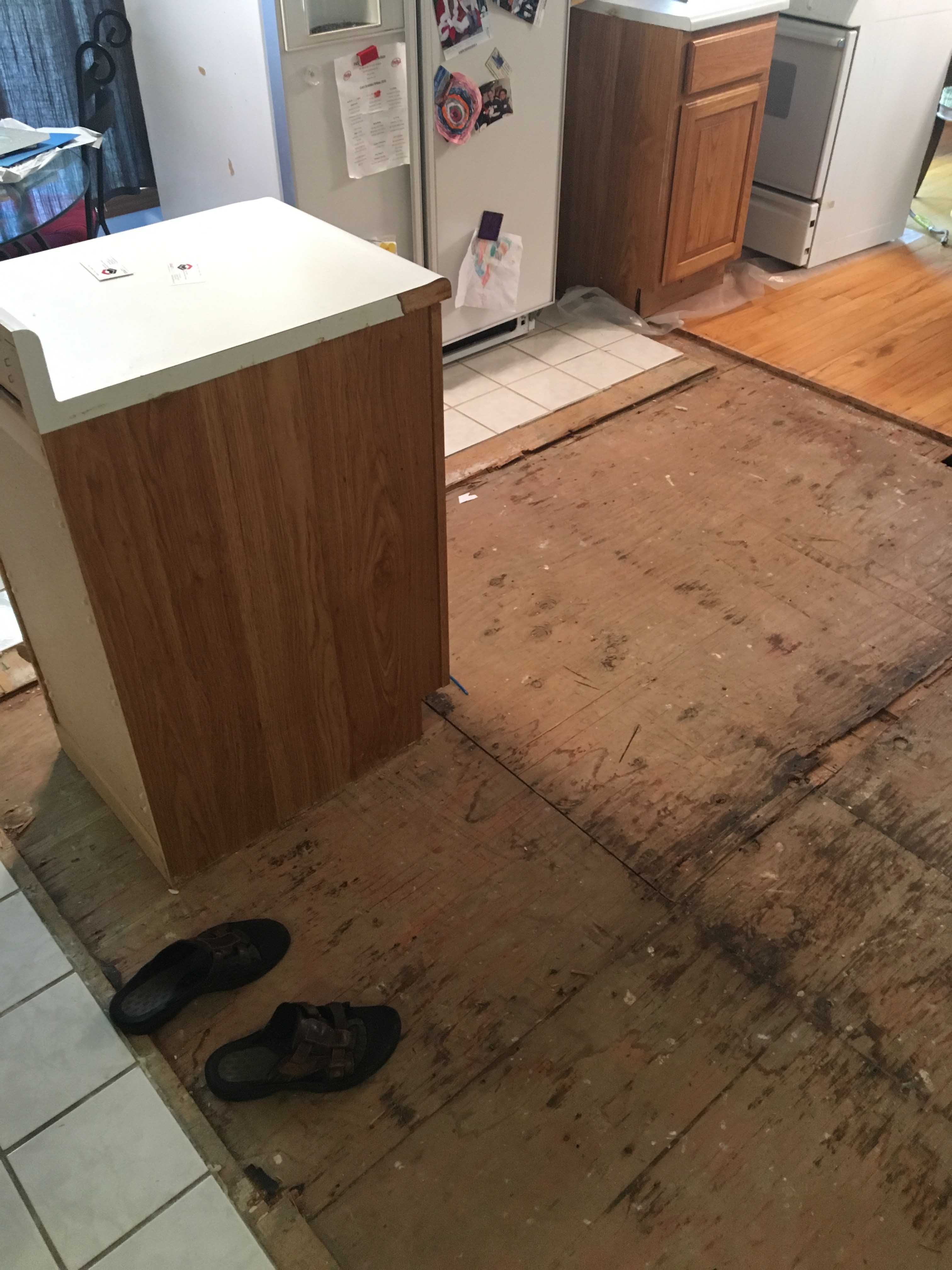 repair wood kitchen floor after water damage in Ann Arbor